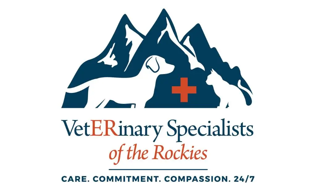 Veterinary Specialists of the Rockies logo featuring stylized mountains, a paw print, and a red medical cross with the slogan “Care. Commitment. Compassion. 24/7.”
